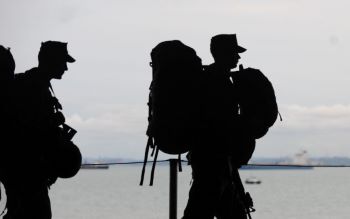 Soldiers with large ruck packs