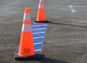 Orange traffic cones in a parking lot