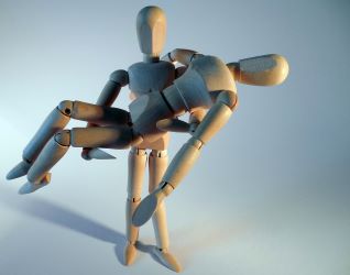 Model of a person holding another person
