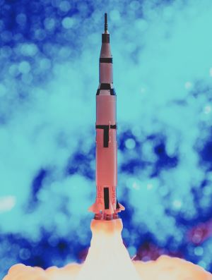 Model of a Saturn V rocket during launch