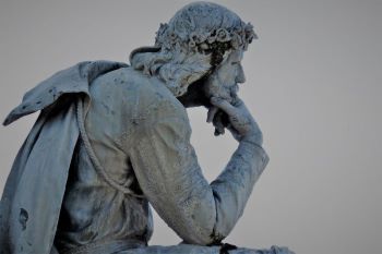 Statue of contemplative person